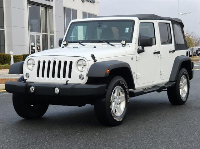 used 2015 Jeep Wrangler Unlimited car, priced at $18,795