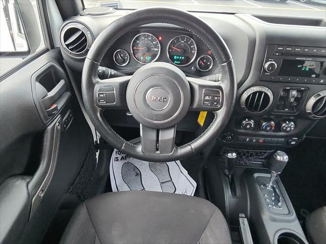 used 2015 Jeep Wrangler Unlimited car, priced at $18,795