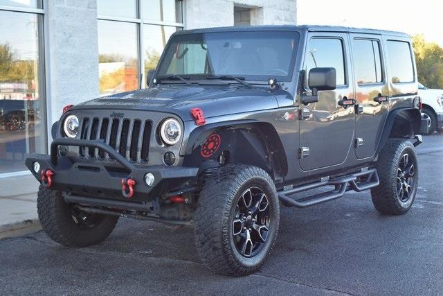 used 2018 Jeep Wrangler JK Unlimited car, priced at $24,974