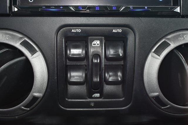 used 2014 Jeep Wrangler Unlimited car, priced at $13,590