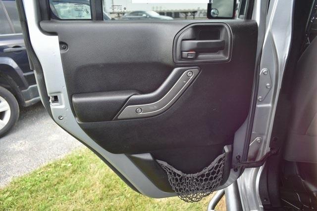 used 2014 Jeep Wrangler Unlimited car, priced at $13,590