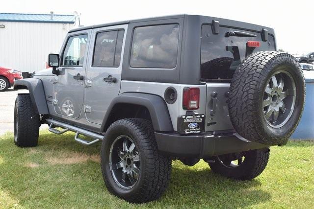 used 2014 Jeep Wrangler Unlimited car, priced at $13,590