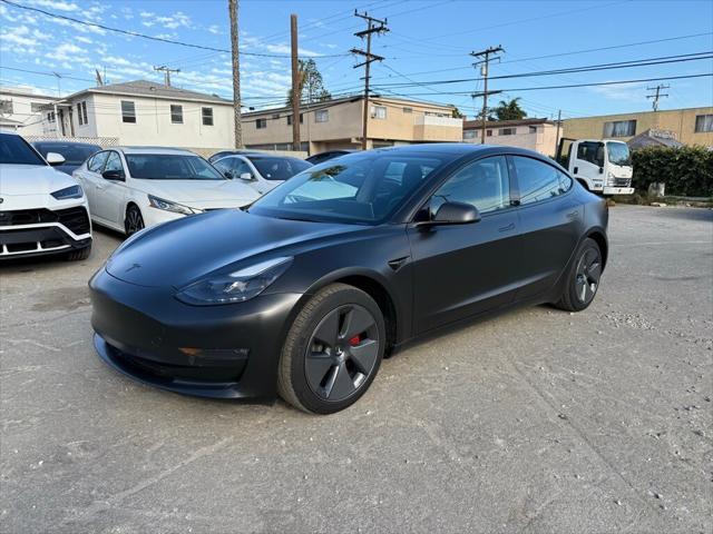 used 2022 Tesla Model 3 car, priced at $27,999