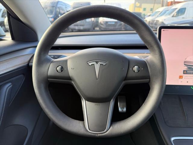 used 2022 Tesla Model 3 car, priced at $27,999