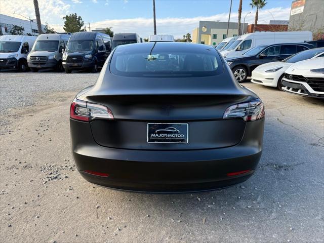 used 2022 Tesla Model 3 car, priced at $27,999