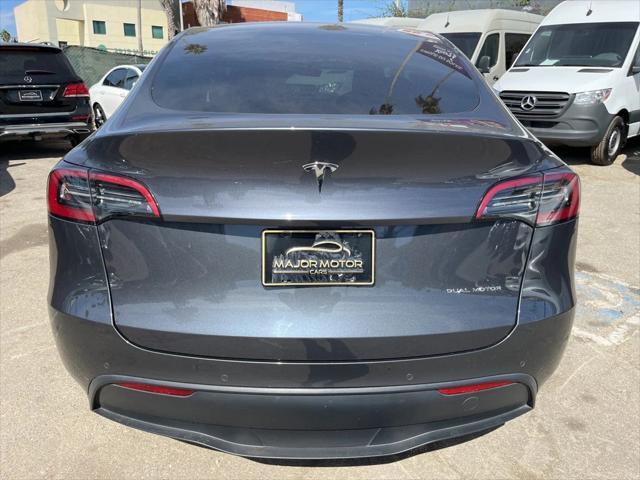 used 2022 Tesla Model Y car, priced at $33,215