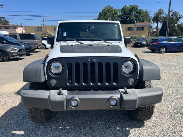 used 2017 Jeep Wrangler Unlimited car, priced at $18,933