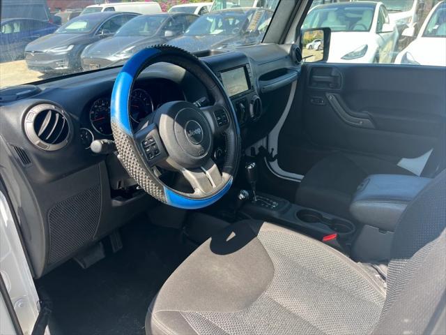 used 2017 Jeep Wrangler Unlimited car, priced at $18,933