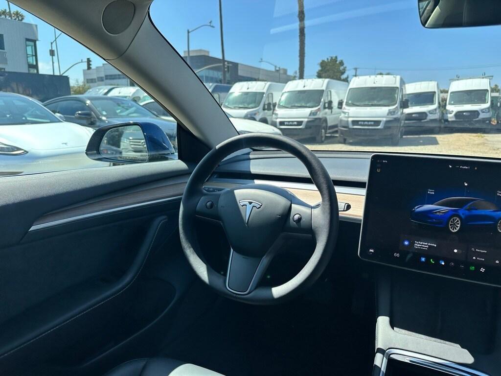 used 2022 Tesla Model 3 car, priced at $24,094