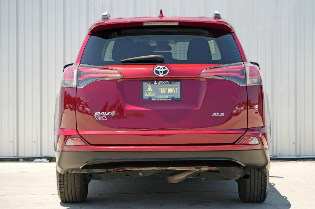 used 2018 Toyota RAV4 car, priced at $15,000