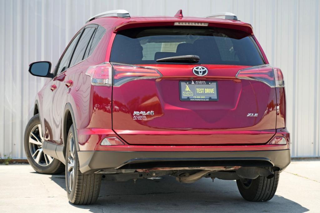 used 2018 Toyota RAV4 car, priced at $15,000