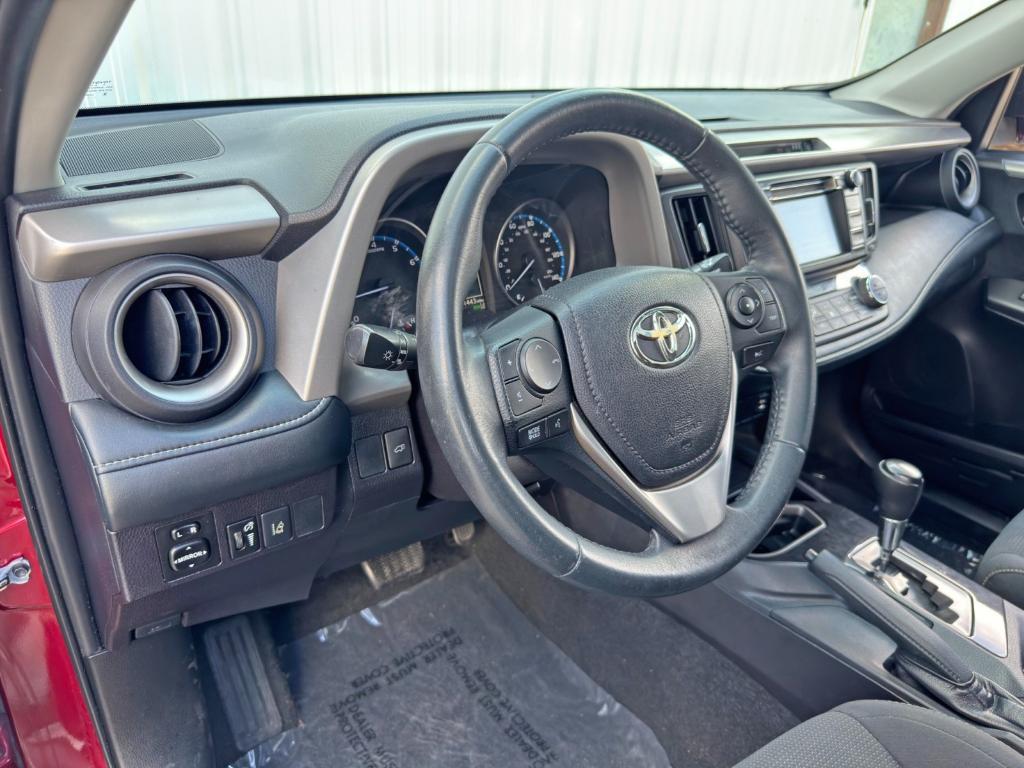 used 2018 Toyota RAV4 car, priced at $15,000