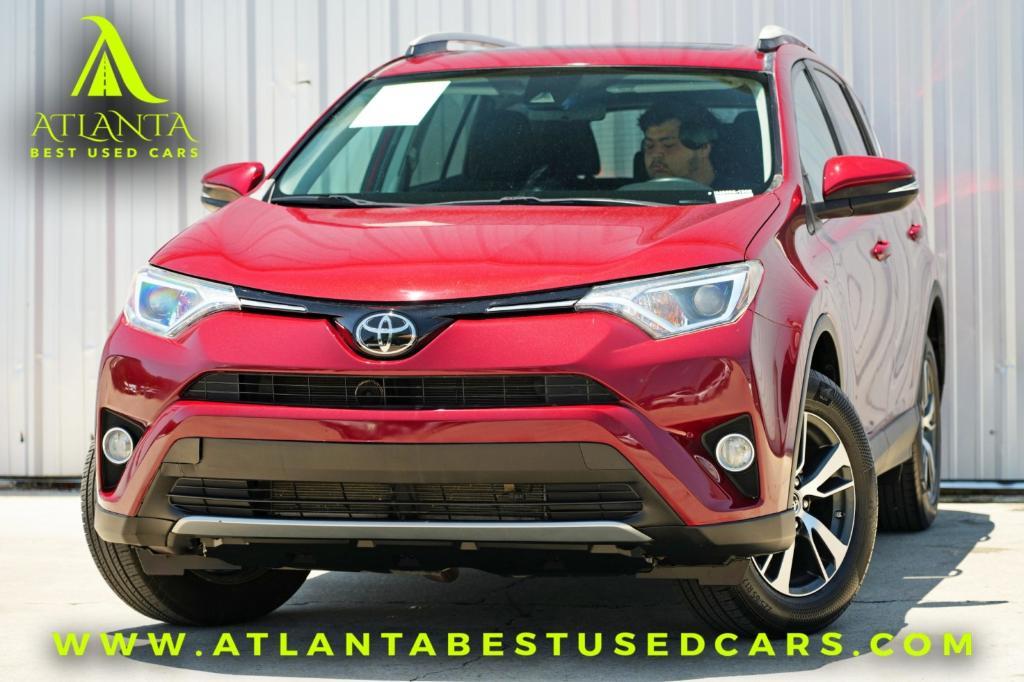 used 2018 Toyota RAV4 car, priced at $15,000