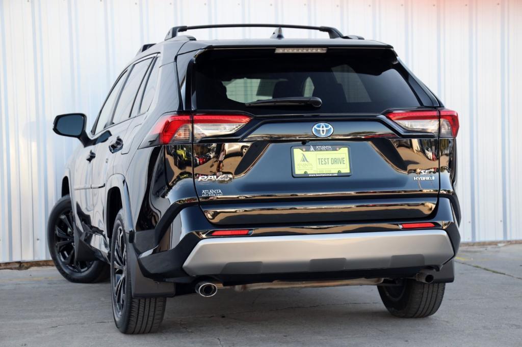 used 2023 Toyota RAV4 Hybrid car, priced at $30,000