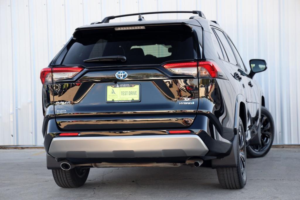 used 2023 Toyota RAV4 Hybrid car, priced at $30,000