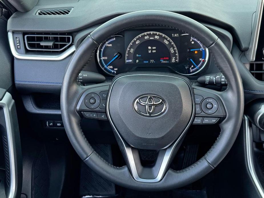 used 2023 Toyota RAV4 Hybrid car, priced at $30,000