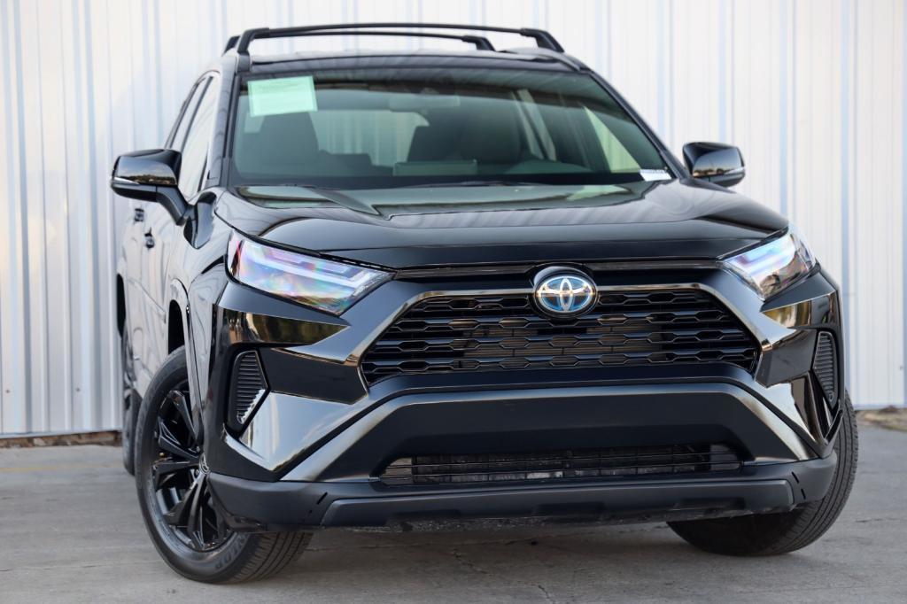 used 2023 Toyota RAV4 Hybrid car, priced at $30,000