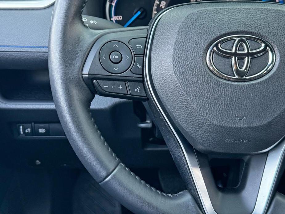 used 2023 Toyota RAV4 Hybrid car, priced at $30,000