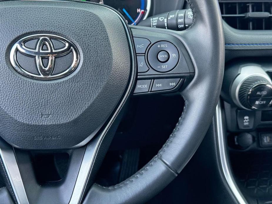 used 2023 Toyota RAV4 Hybrid car, priced at $30,000