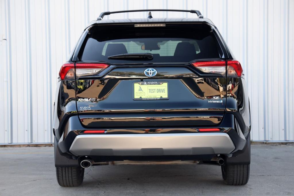 used 2023 Toyota RAV4 Hybrid car, priced at $30,000