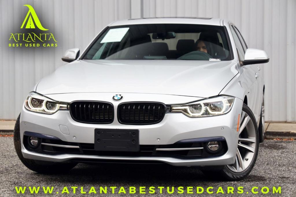 used 2018 BMW 330e car, priced at $16,000