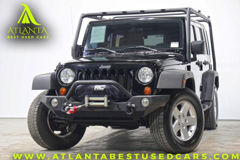 used 2011 Jeep Wrangler Unlimited car, priced at $12,000