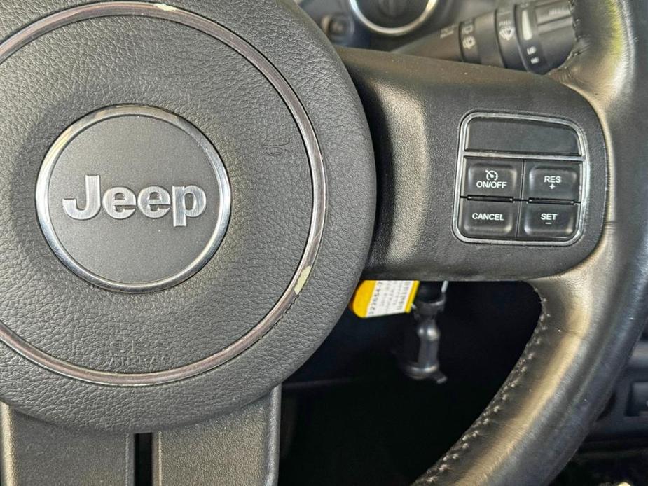 used 2014 Jeep Wrangler Unlimited car, priced at $12,500