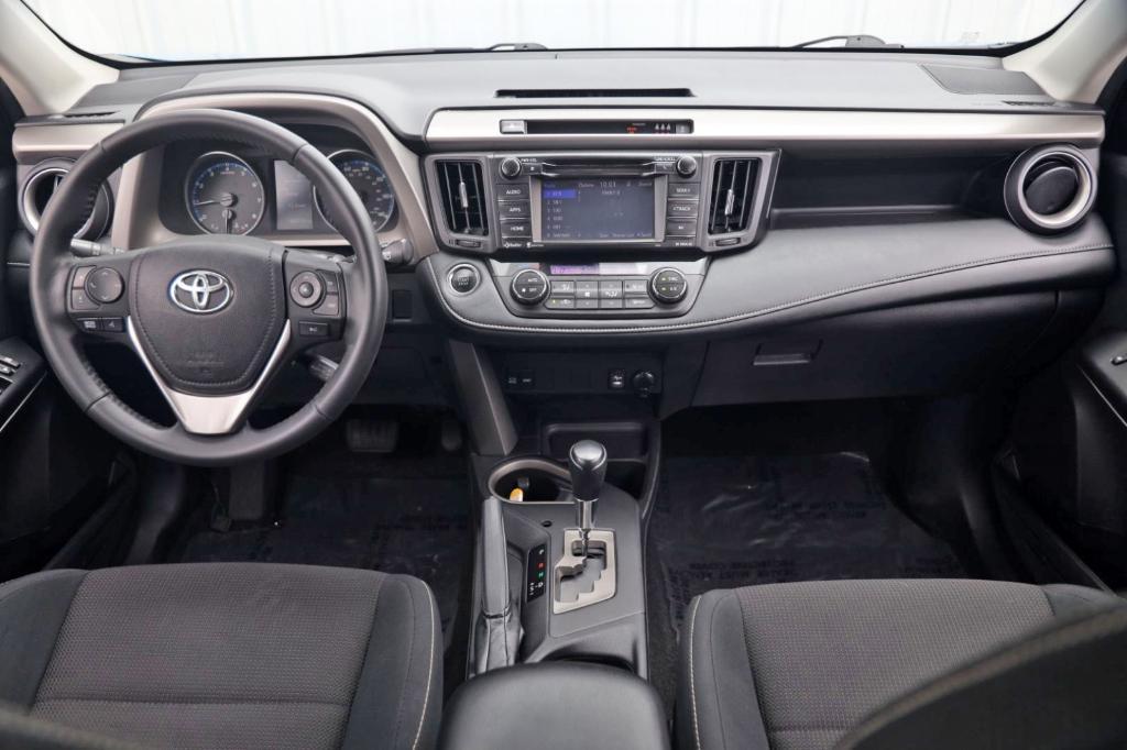 used 2018 Toyota RAV4 car, priced at $13,000