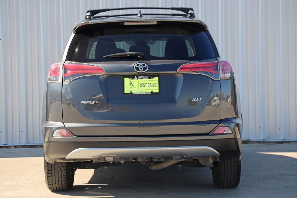 used 2018 Toyota RAV4 car, priced at $12,000