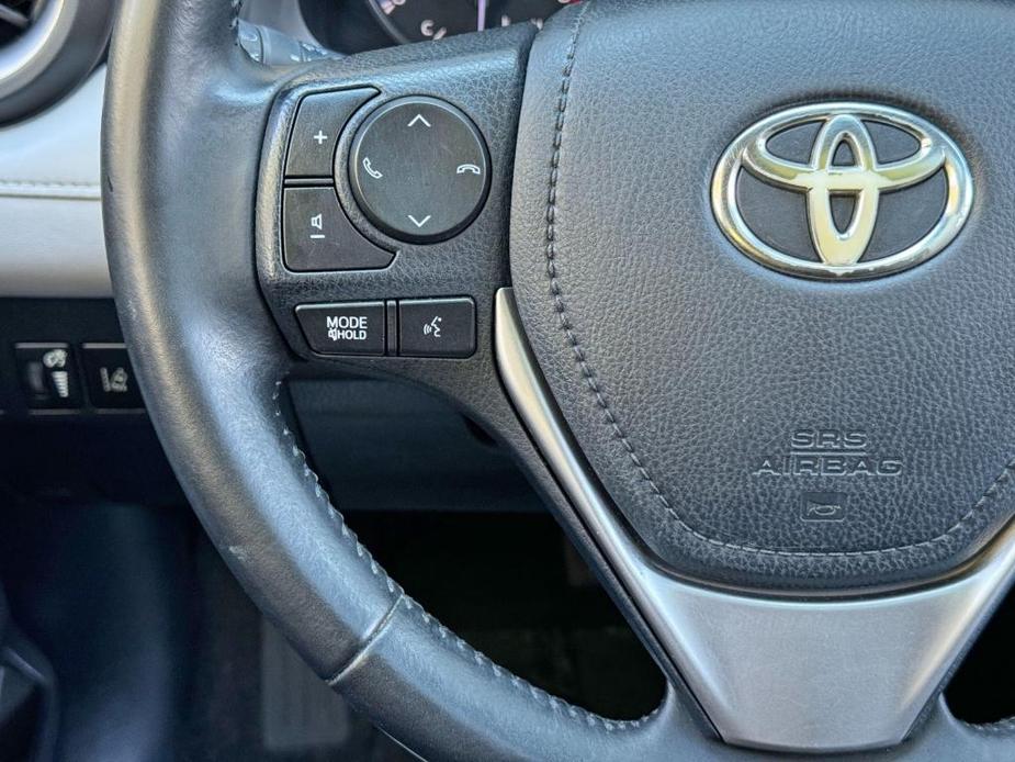 used 2018 Toyota RAV4 car, priced at $12,000