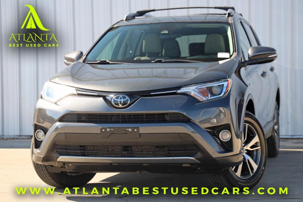 used 2018 Toyota RAV4 car, priced at $12,000