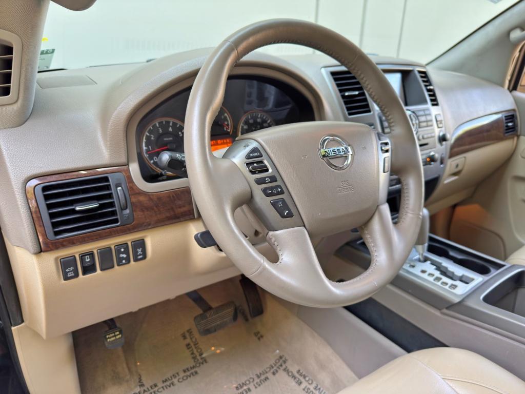 used 2013 Nissan Armada car, priced at $10,000