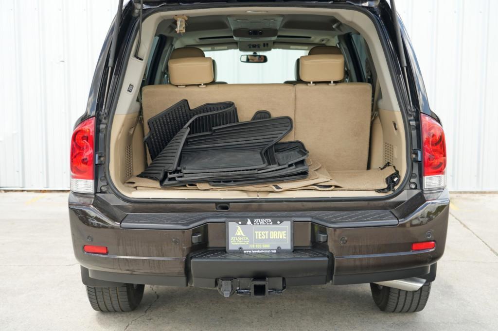 used 2013 Nissan Armada car, priced at $10,000