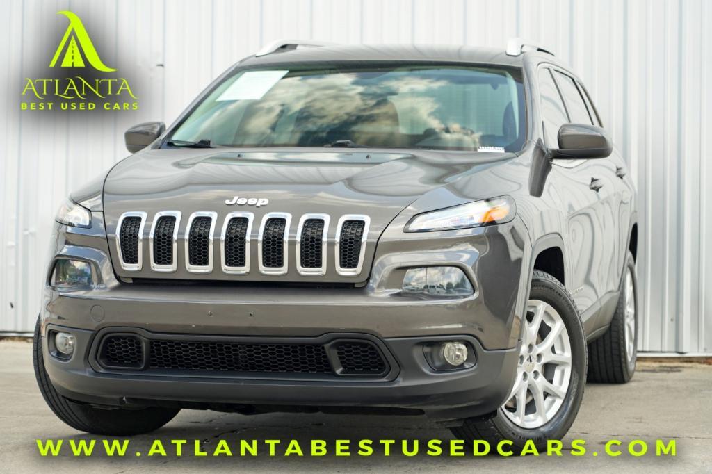 used 2014 Jeep Cherokee car, priced at $7,000