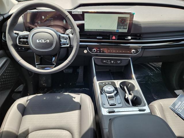 new 2025 Kia Carnival Hybrid car, priced at $53,054