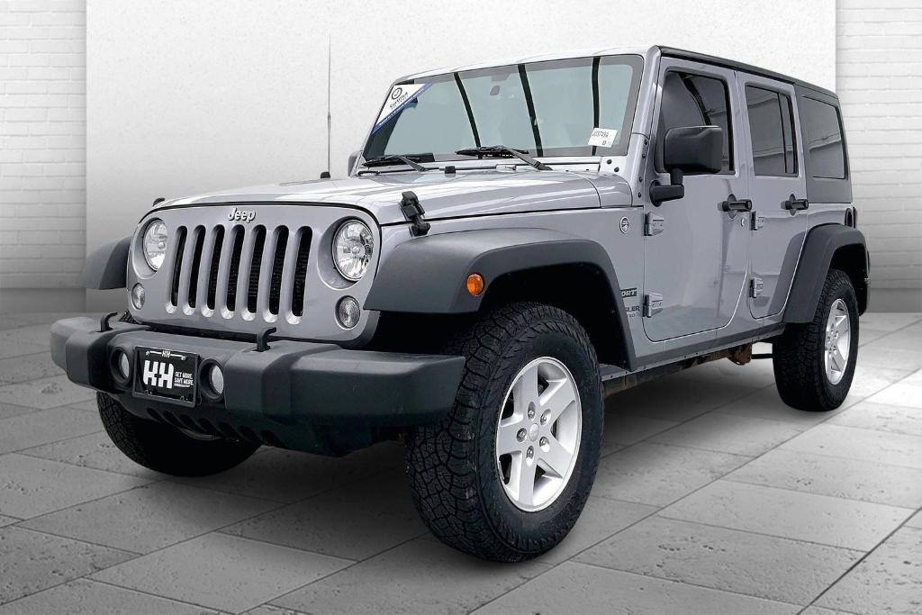 used 2015 Jeep Wrangler Unlimited car, priced at $17,891