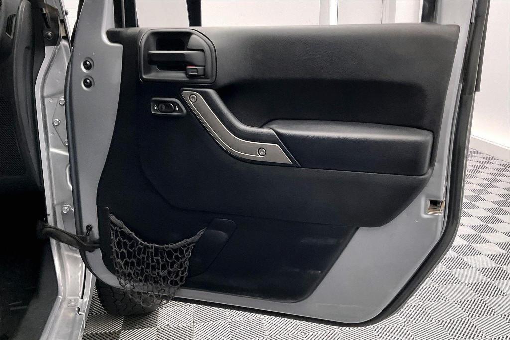 used 2015 Jeep Wrangler Unlimited car, priced at $17,891