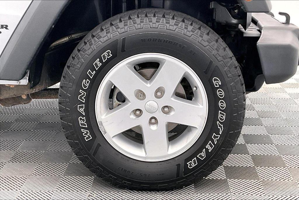 used 2015 Jeep Wrangler Unlimited car, priced at $17,891