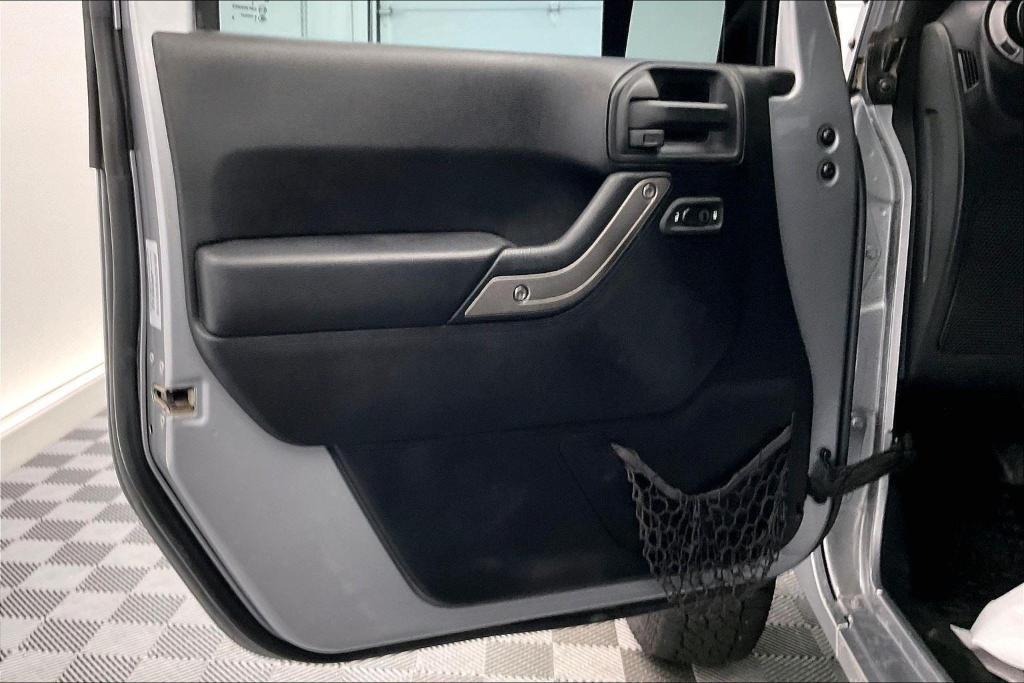 used 2015 Jeep Wrangler Unlimited car, priced at $17,891