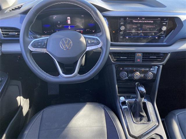 used 2024 Volkswagen Taos car, priced at $24,654