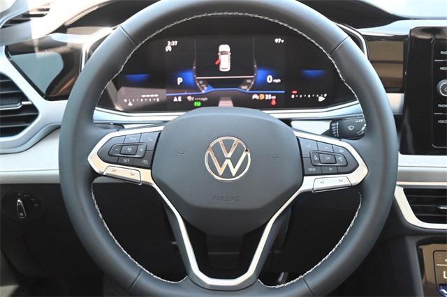 new 2025 Volkswagen Taos car, priced at $30,856