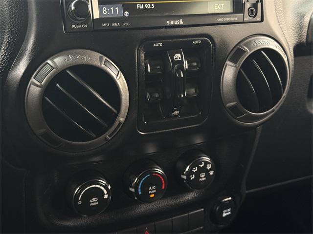 used 2014 Jeep Wrangler Unlimited car, priced at $14,998