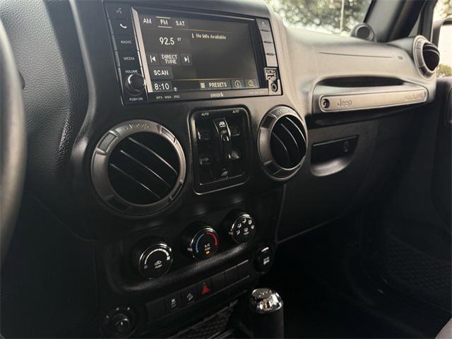 used 2014 Jeep Wrangler Unlimited car, priced at $14,998