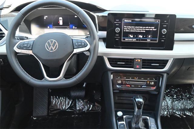 new 2025 Volkswagen Taos car, priced at $27,631