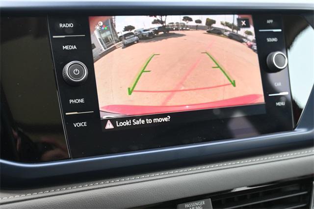 used 2024 Volkswagen Taos car, priced at $24,434