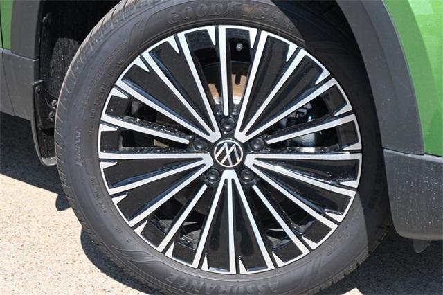 new 2025 Volkswagen Taos car, priced at $27,728