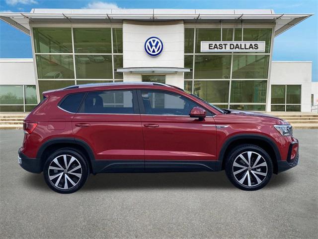 used 2023 Volkswagen Taos car, priced at $22,922