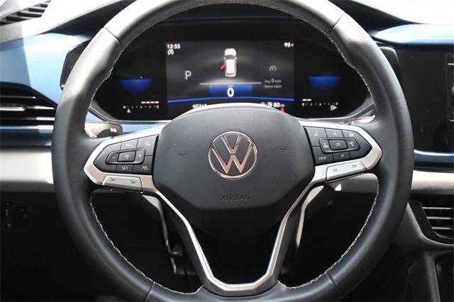 used 2023 Volkswagen Taos car, priced at $23,577