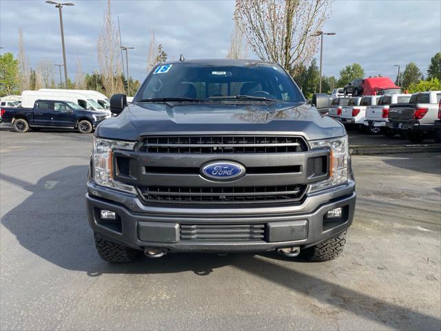 used 2018 Ford F-150 car, priced at $26,877