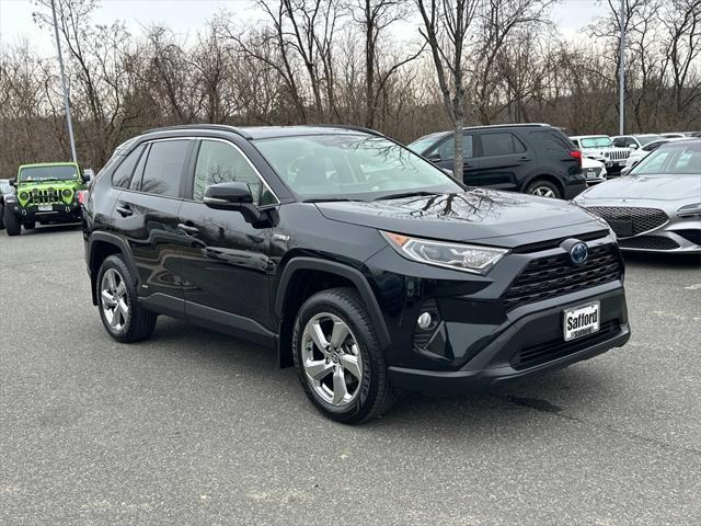 used 2021 Toyota RAV4 Hybrid car, priced at $29,000